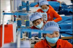 vn-theu-cong-nhan-may-mac