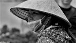 cone-hat-mask-facemask-coronavirus-covid-vietnamese-woman-worry-danger