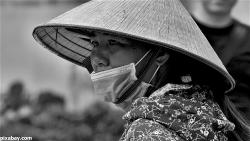 cone-hat-mask-facemask-coronavirus-covid-vietnamese-woman-worry-danger
