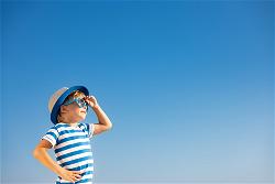 happy-child-having-fun-outdoor-against-blue-sky-2022-01-10-15-46-11-utc