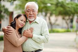 happily-married-portrait-hugging-aged-vietnamese-couple-69454306