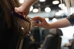 professional-hairdresser-making-stylish-haircut-pslbgwr